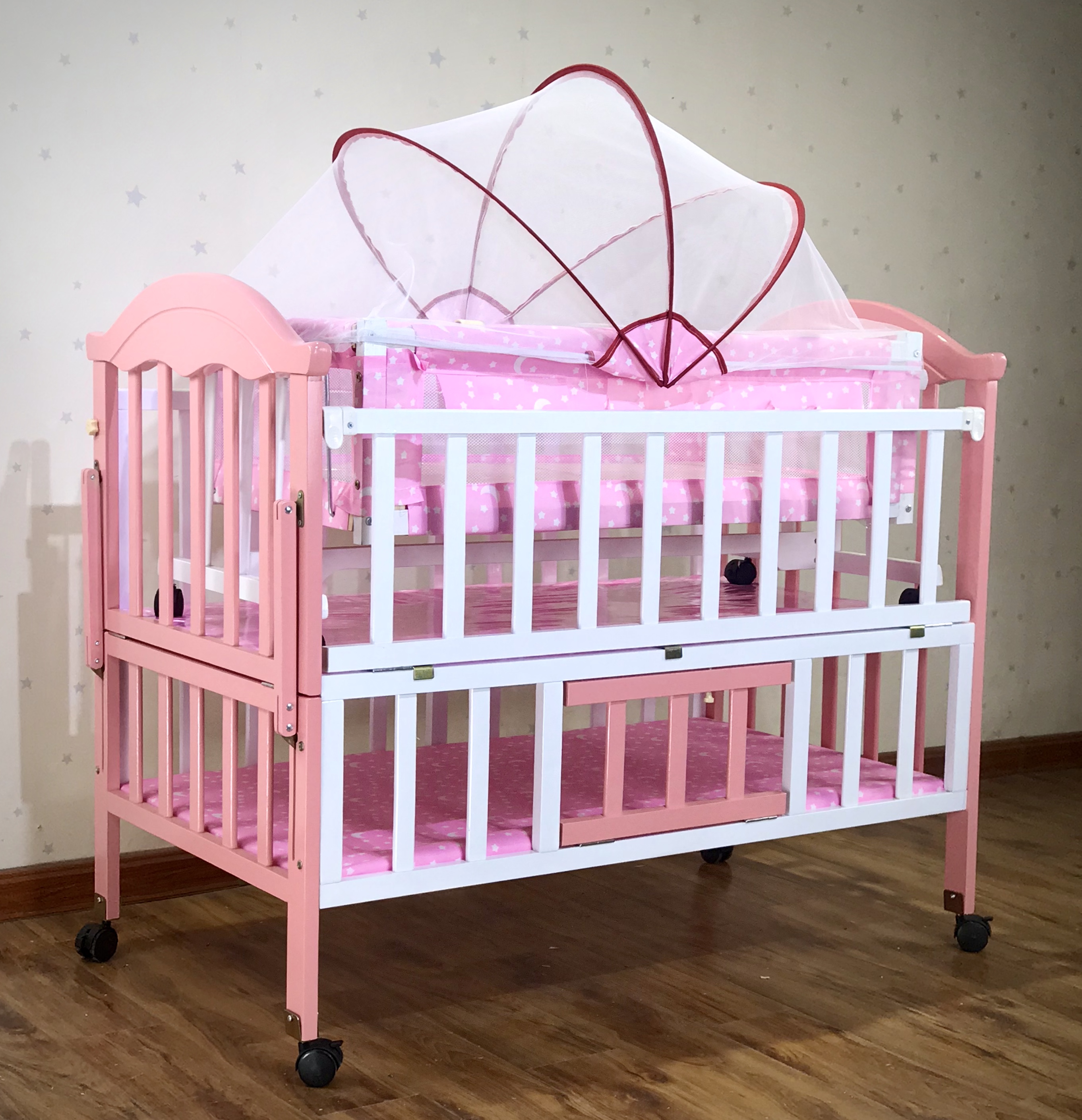 pink baby crib